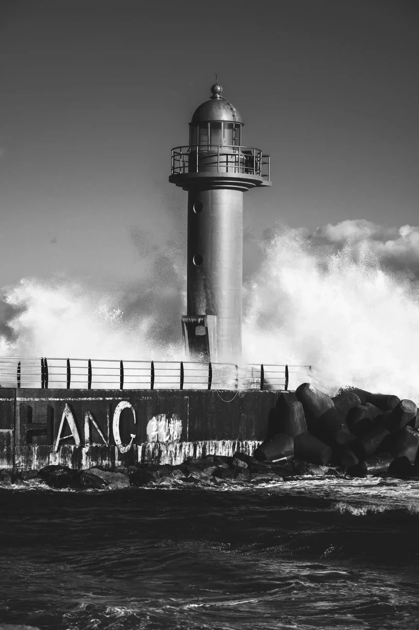 Monochrome Impact, from A Lighthouse Stands Where the Land Ends