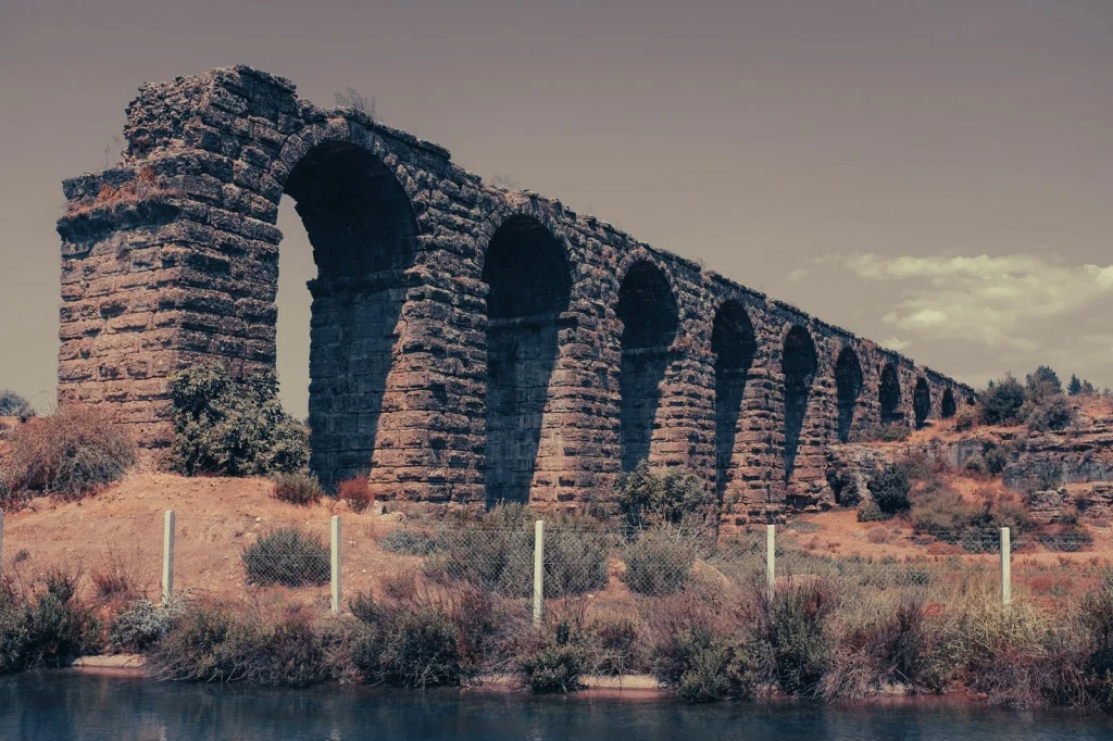 Stone Arches, from Aqueducts: The Slope You Cannot See