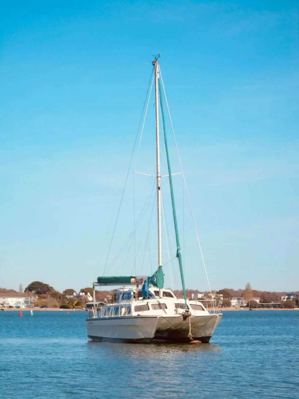 Sailboat on Calm Water, from Canoes: The Boats That Settled the Pacific