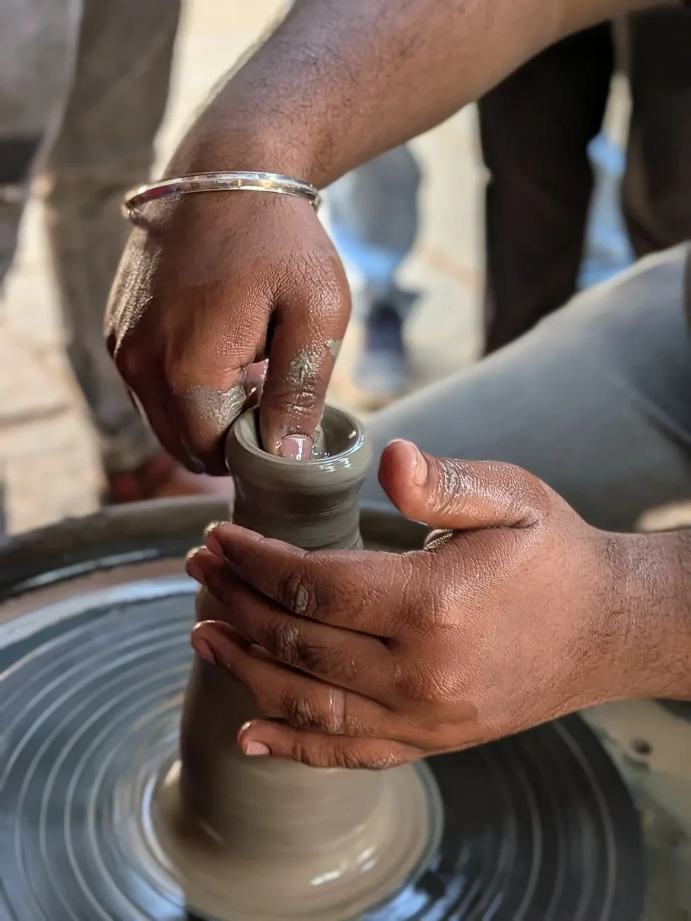 Hands at Work, from Ceramics: The Oldest Craft
