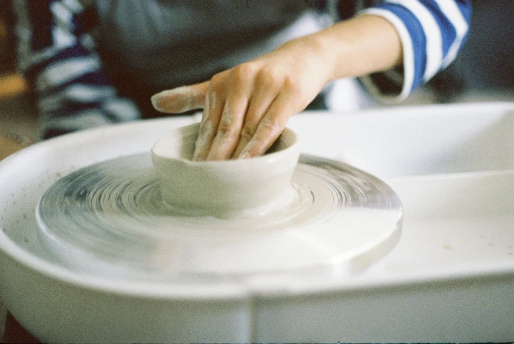 At the Wheel, from Ceramics
