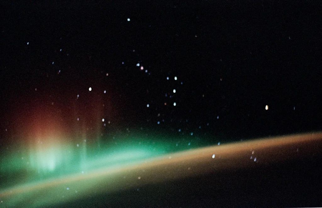 Aurora over Earth limb, from Earth From Above: A Very Thin Atmosphere
