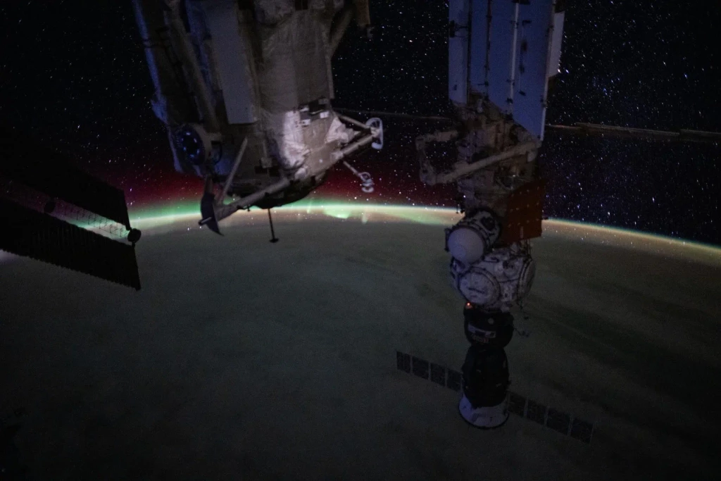 Aurora Earth Limb Behind Soyuz, from Earth From Space