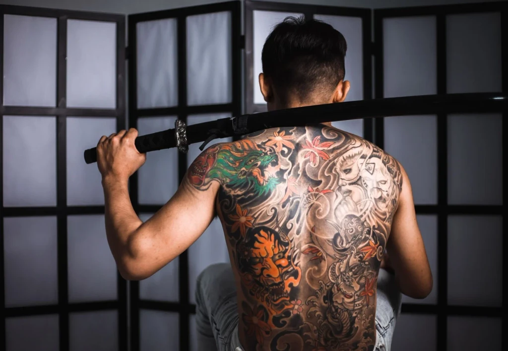 Posed Figure, from Ink Under the Skin: A History of Tattoos