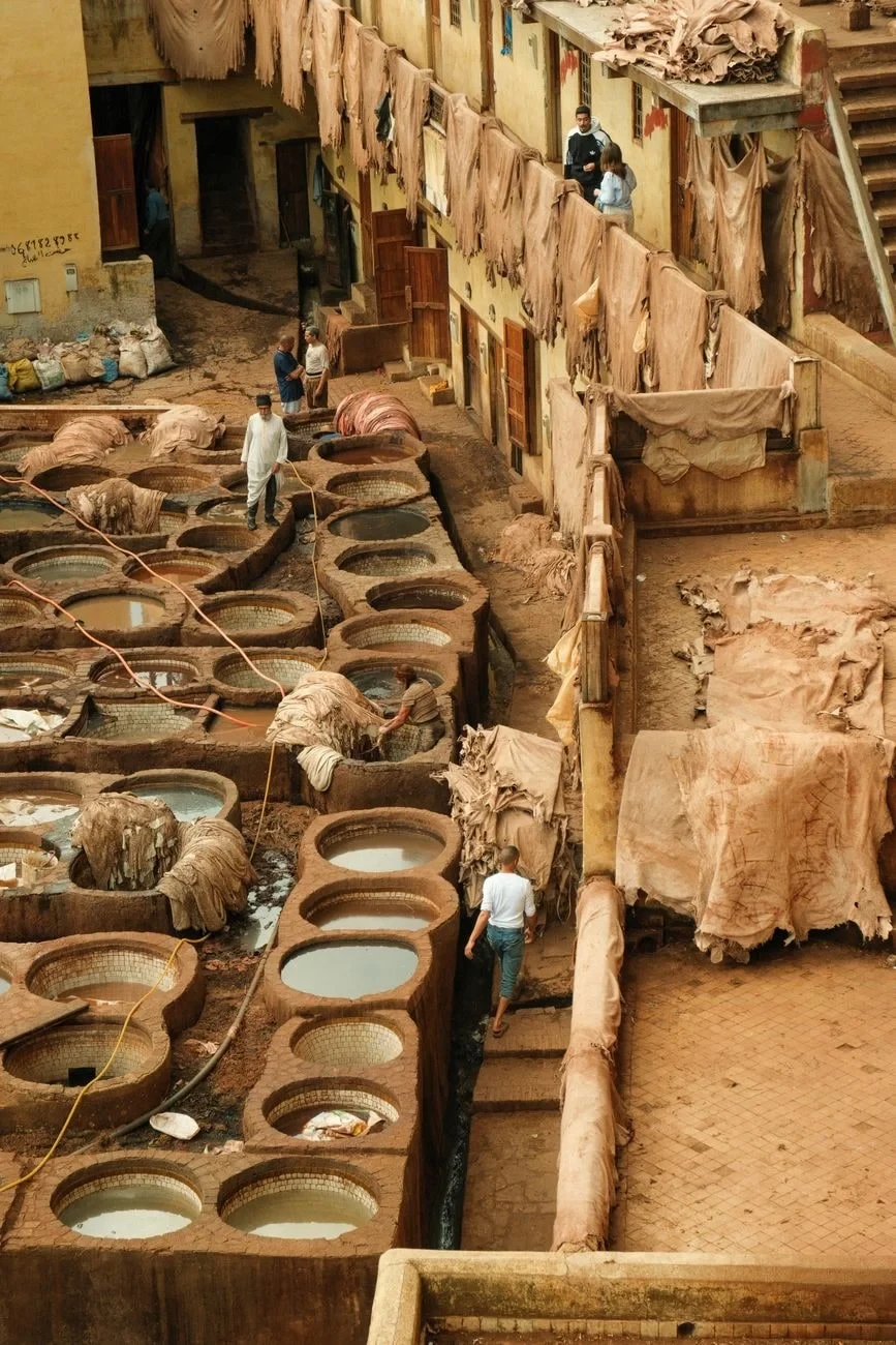 Workers and Vats, from Leather: A Skin Given a Second Life