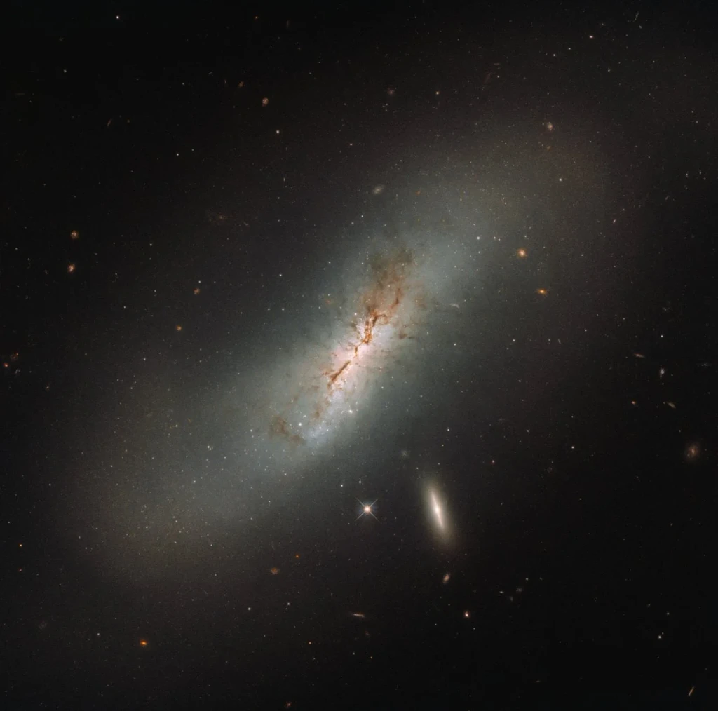 Hubble's makes a double galaxy gaze, from The Cosmos: Where Stars Are Born