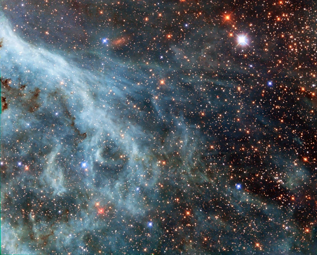 Hubble Sees Turquoise-Tinted Plumes in Large Magellanic Cloud, from The Cosmos