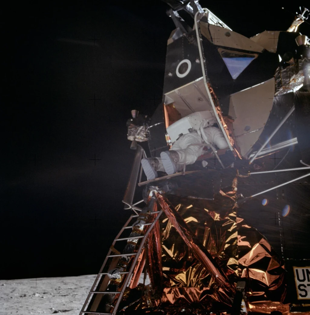 Astronaut Edwin Aldrin egresses lunar module on lunar surface, from The Moon: Getting There and Back
