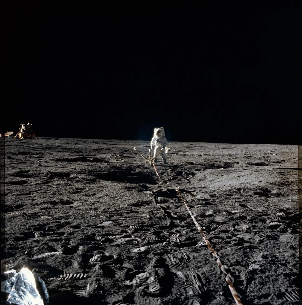 Astronaut Alan Bean deploys Lunar Surface Magnetometer on lunar surface, from The Moon