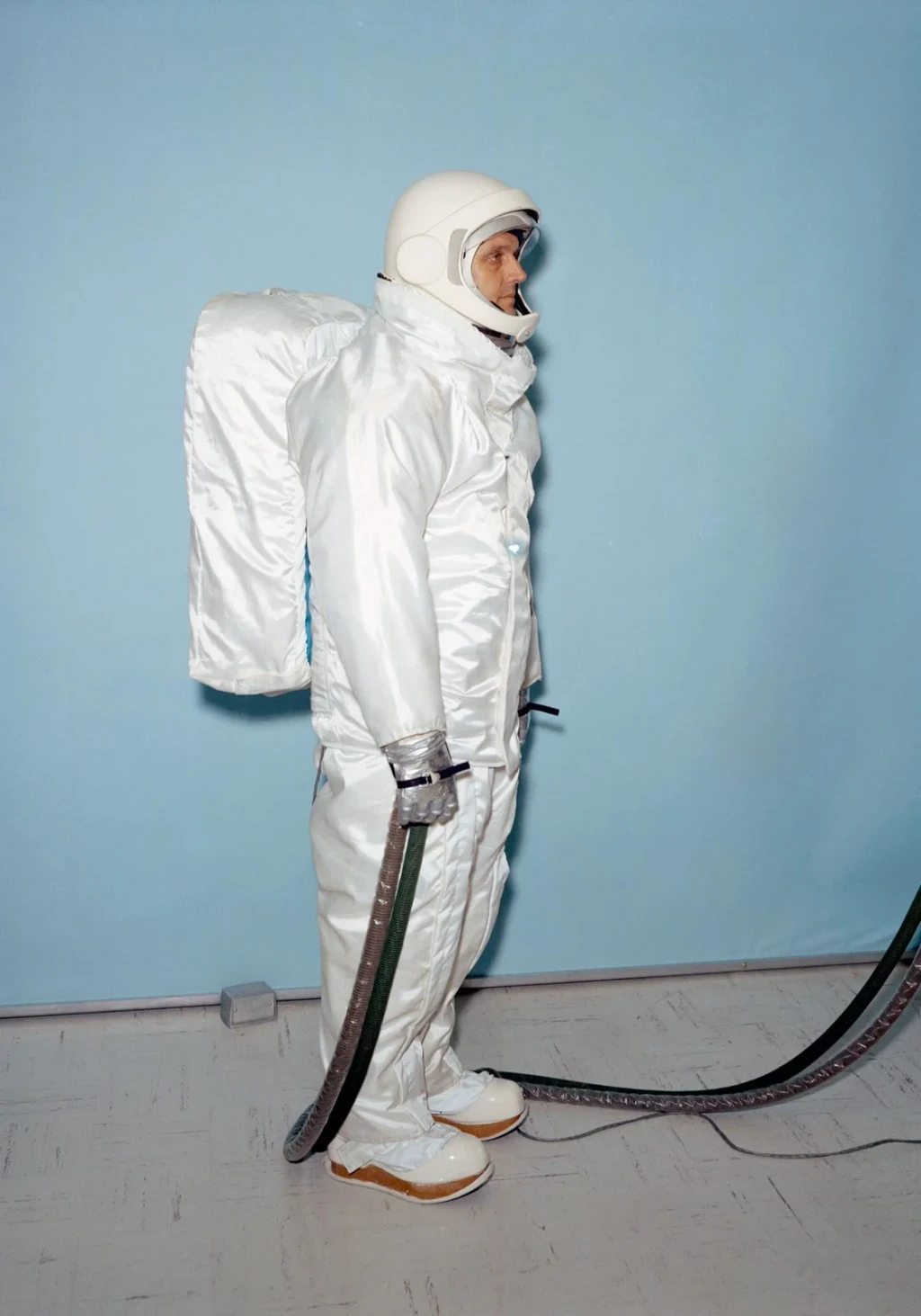 Test subject wears Apollo overgarment designed for use on lunar surface, from The Moon