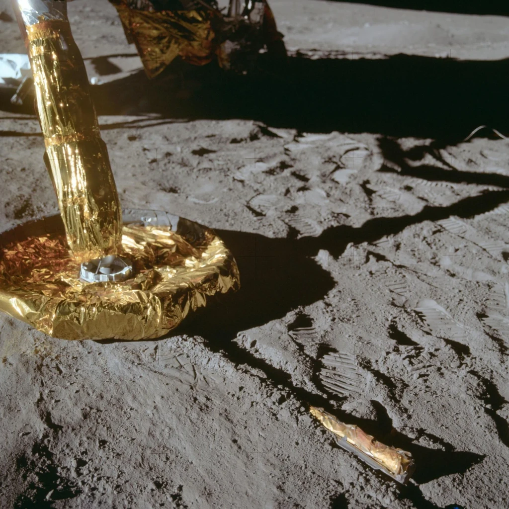 View of footpad of Apollo 11 Lunar Module as it rested on lunar surface, from The Moon