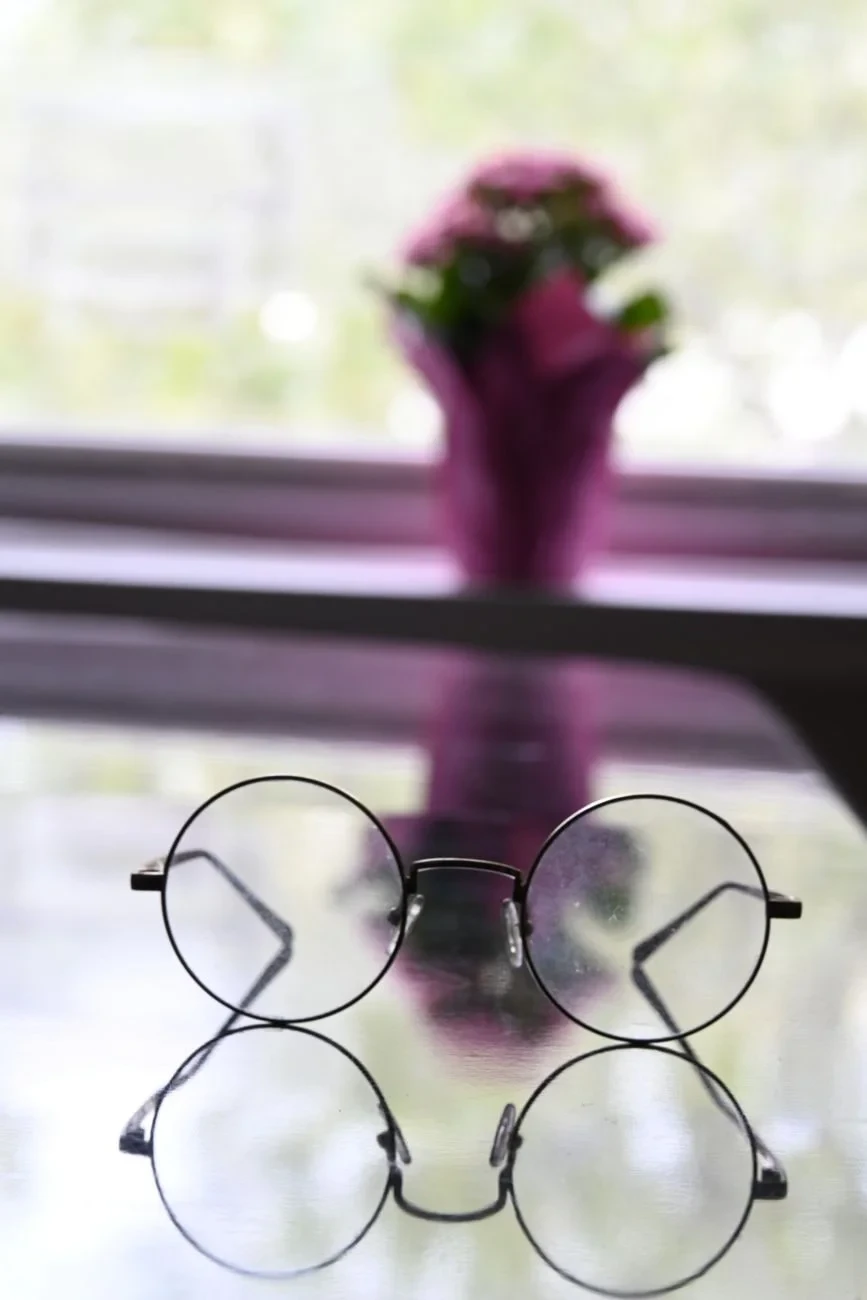 Glasses and Bloom, from Through the Lens, Further Than the Eye