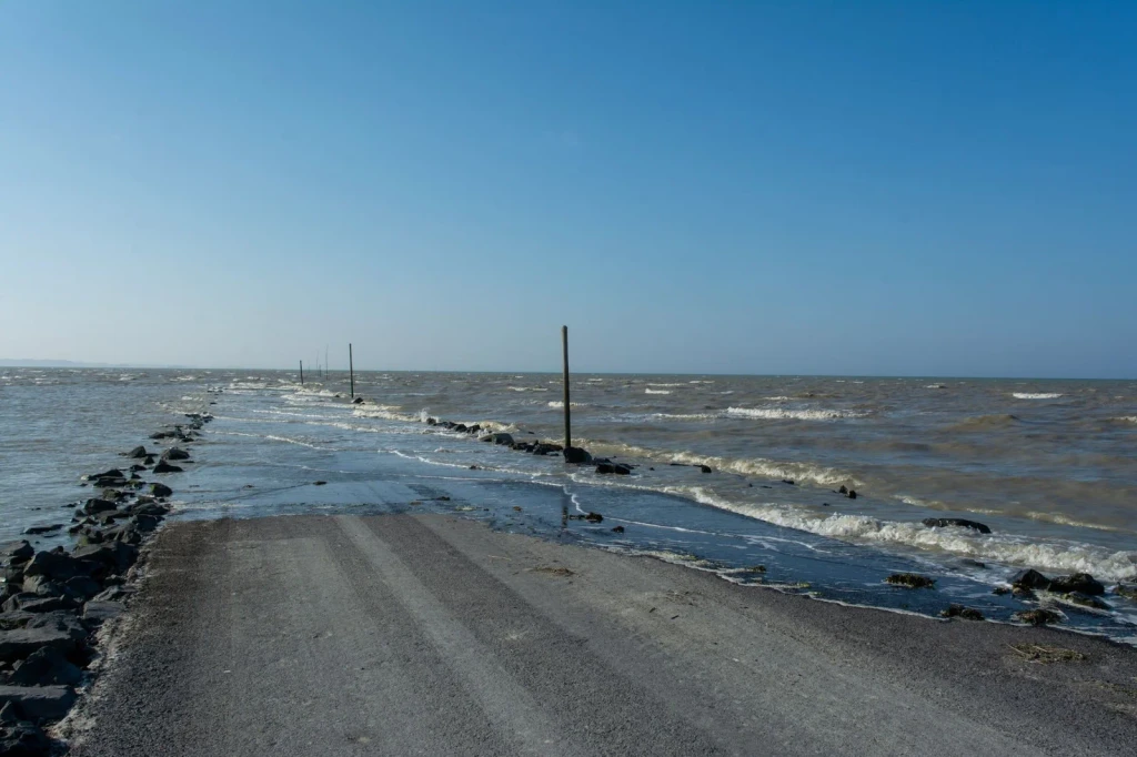 Flooded Road, from Tides: The Moon Pulling at the Ocean