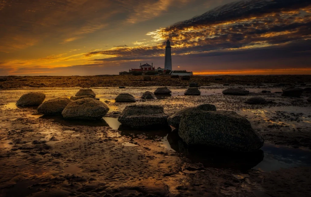 Lighthouse Sunset, from Tides: The Moon Pulling at the Ocean