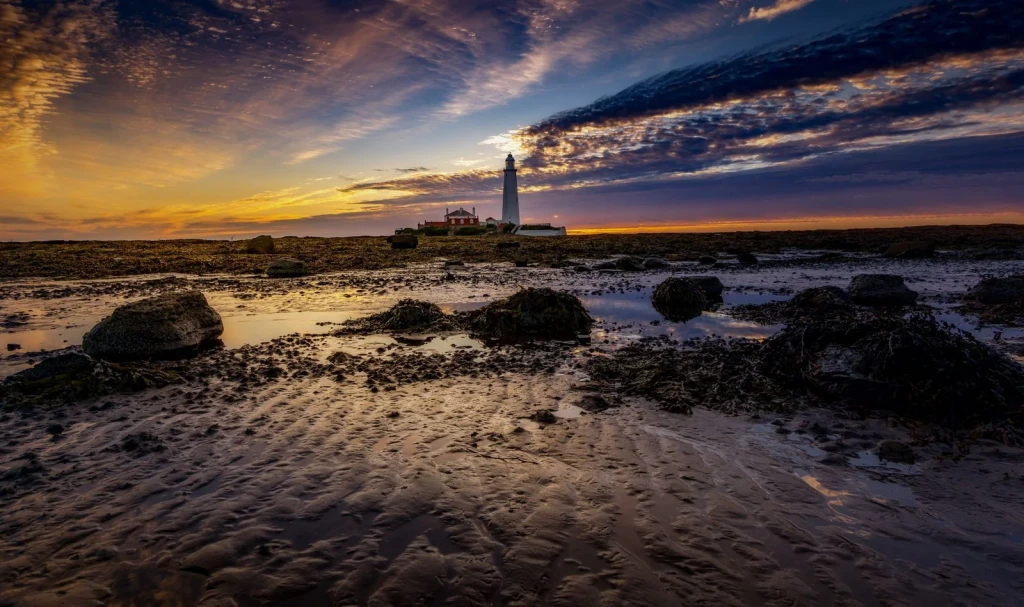 Lighthouse at Dusk, from Tides: The Moon Pulling at the Ocean