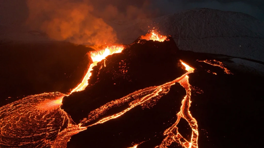 Nocturnal Eruption, from Volcanoes Are the Planet Rebuilding Itself
